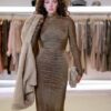ABITO LUNGO LUREX ORO CON GRANDE OBLÒ SULLA SCHIENA