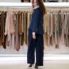 BLAZER IN DENIM CON RICAMI IN ORO E LUNGHEZZA ASIMMETRICA